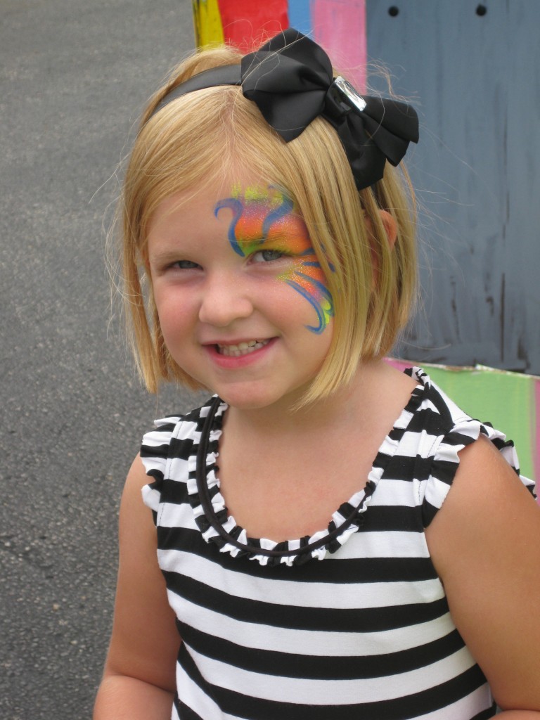 There is always a line at the face painting booth during our Back to School Carnival